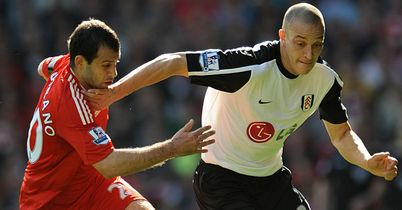 Mascherano and Zamora: Tussle for possession